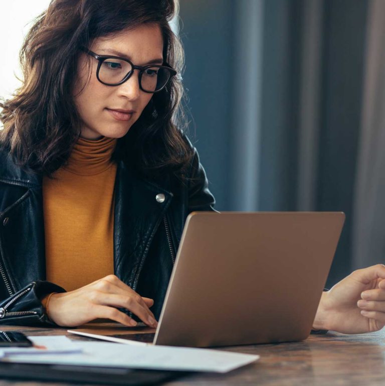 Asian woman working laptop at office